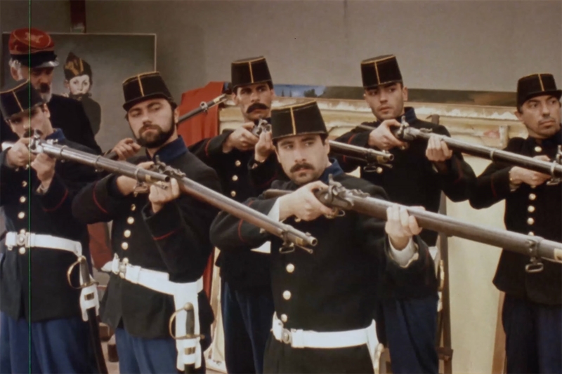 Actors pose as a mid-nineteenth century Mexican firing squad, in the style of Edouard Manet's painting 