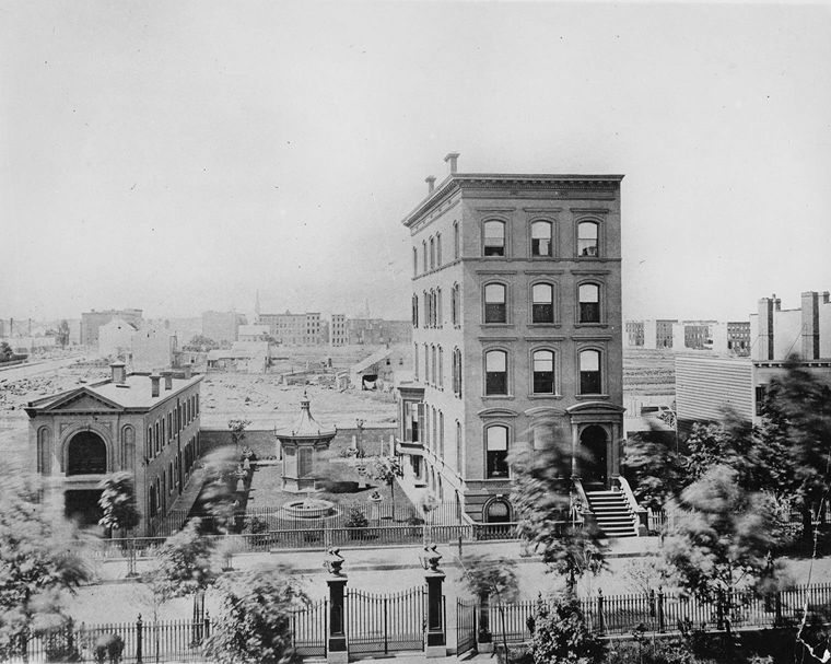 Archival photograph of a late-19th-century New York townhome on West 54th street.