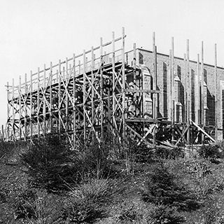 Black and white photograph of Cloisters under construction
