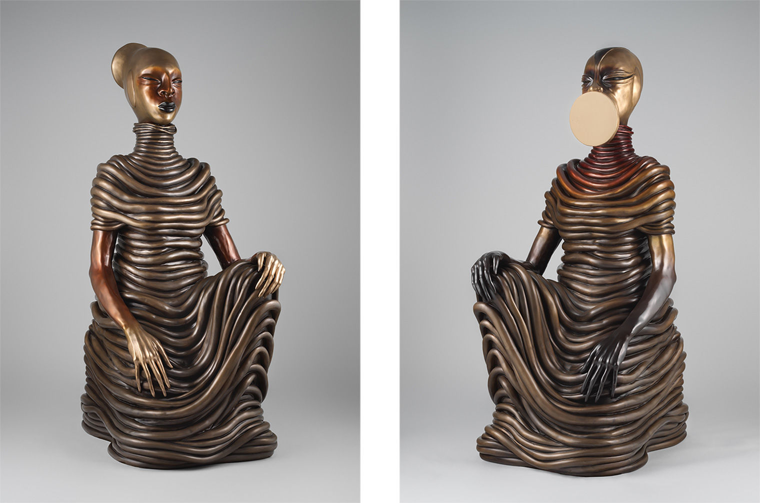 Two patinated bronze sculptures of seated women with coils and mirrored surfaces