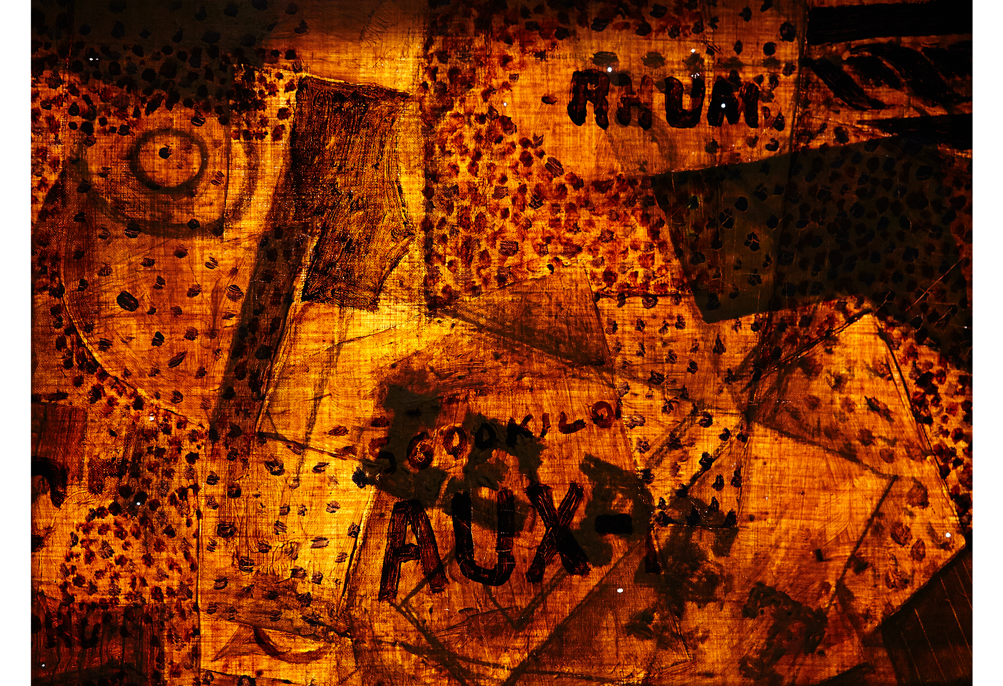 “Bottle of Rum” seen in orange and black tones through infrared light showing pinholes in the painting and the letters “Le Pe”
